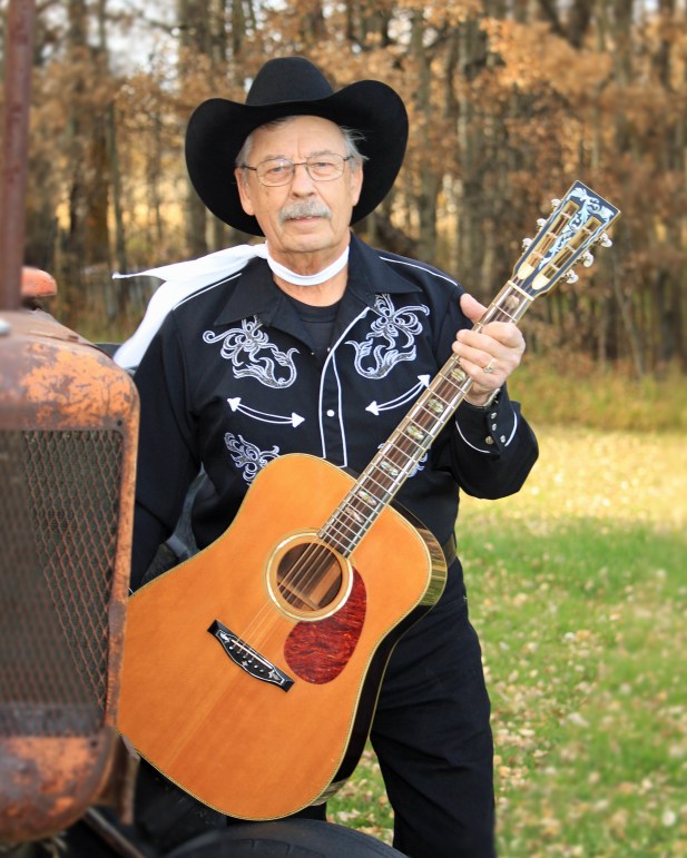 Sam with guitar2.jpg